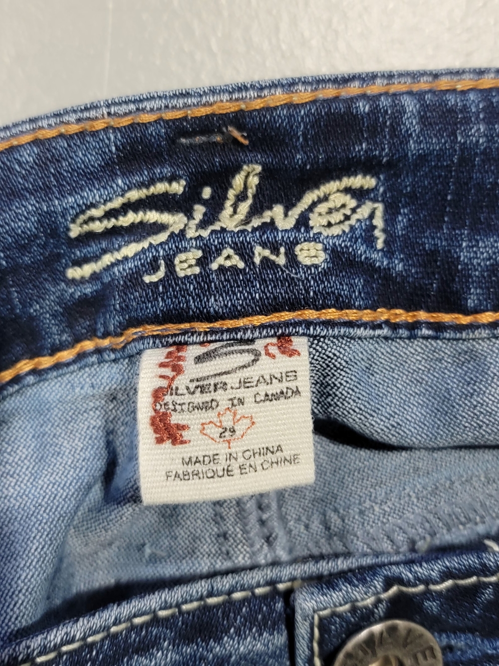 Silver Jeans men's Dark Indigo Bootcut Jeans Waistband Logo